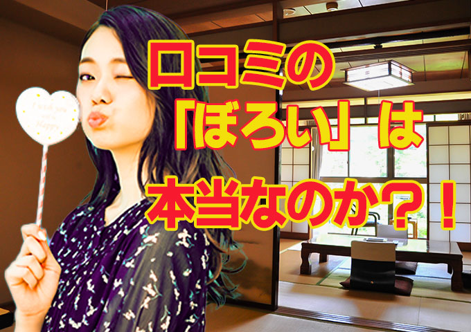 ハートの札を持ったウィンクしてる女性