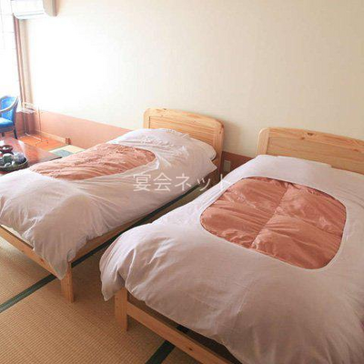 ベッド客室 - ホテルニューおおるり